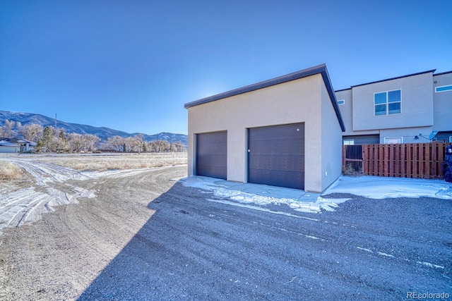 garage featuring a mountain view