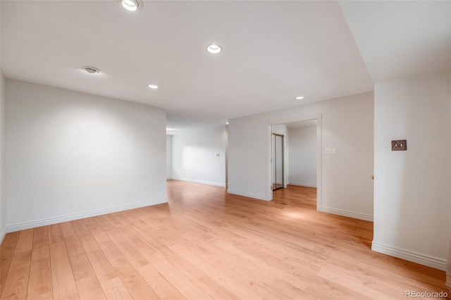 7382 E Bates Dr, Denver, CO 80231 - unfurnished room with light wood finished floors and recessed lighting