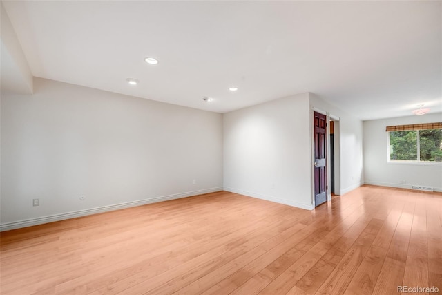 7382 E Bates Dr, Denver, CO 80231 - unfurnished room featuring light wood-style flooring and recessed lighting