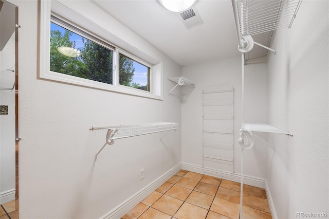 7382 E Bates Dr, Denver, CO 80231 - spacious closet with light tile patterned flooring