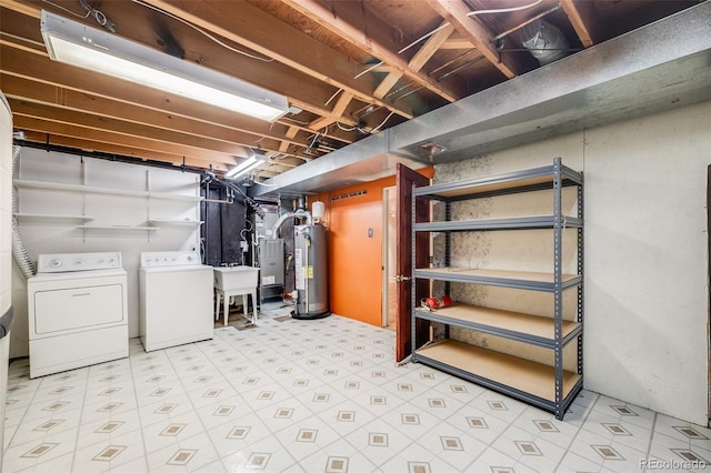 7382 E Bates Dr, Denver, CO 80231 - unfinished below grade area with water heater and washing machine and clothes dryer
