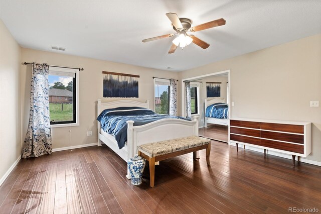 bedroom with ceiling fan and hardwood / wood-style flooring