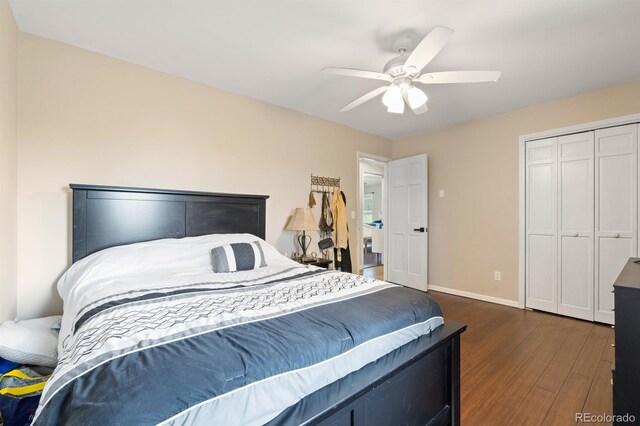 bedroom featuring a closet, ceiling fan, and dark hardwood / wood-style flooring