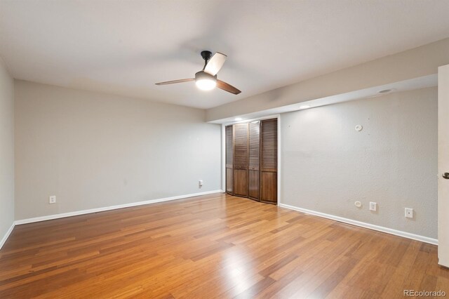 unfurnished bedroom featuring light hardwood / wood-style flooring and ceiling fan