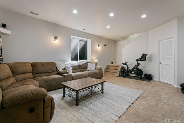 living room featuring light tile floors