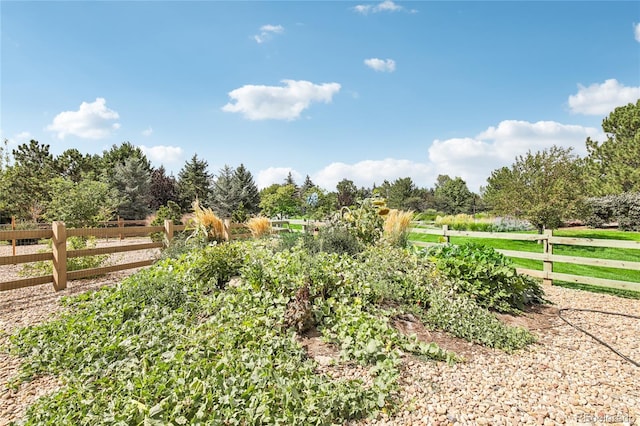 exterior space with a rural view