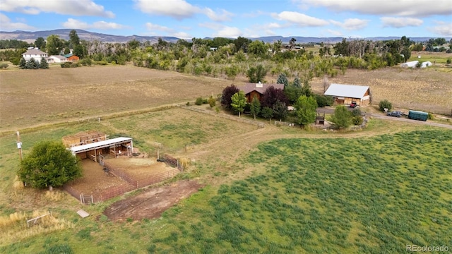 aerial view featuring a mountain view and a rural view