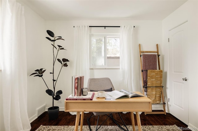 office with baseboards, dark wood finished floors, and visible vents