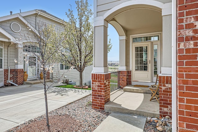 doorway to property featuring a porch