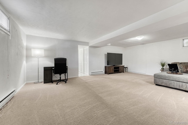 living area with a baseboard heating unit and carpet floors