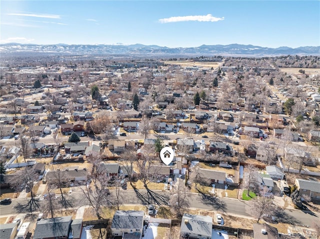 drone / aerial view with a residential view and a mountain view