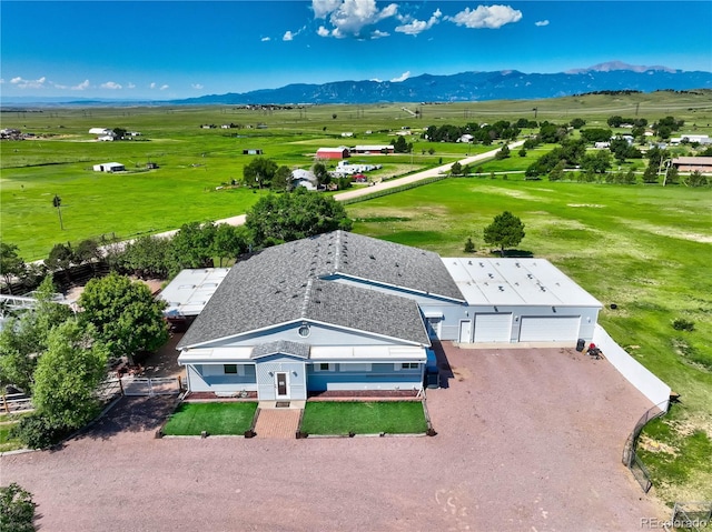 aerial view featuring a mountain view and a rural view