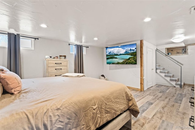 bedroom featuring light wood-type flooring