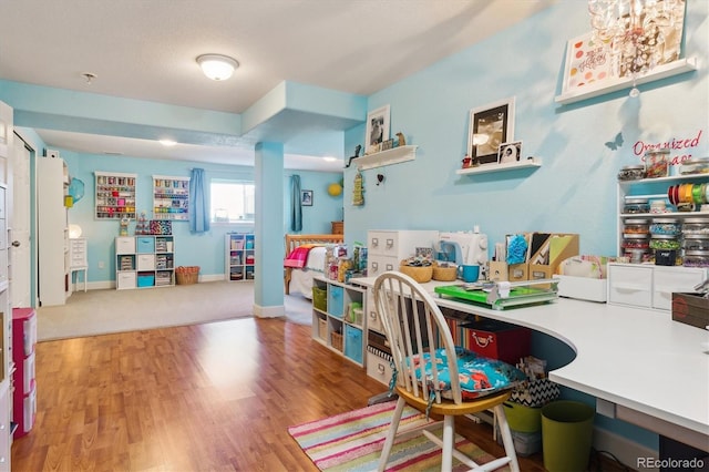 recreation room featuring wood-type flooring