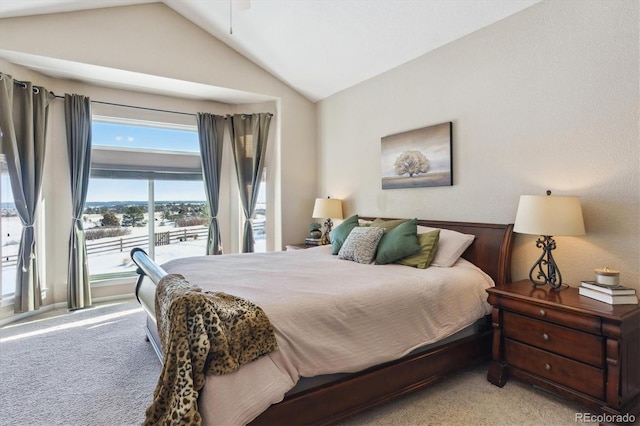 bedroom with access to outside, light colored carpet, and vaulted ceiling