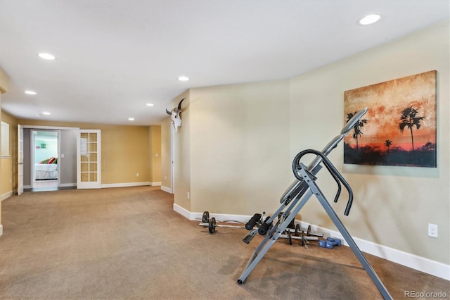 exercise room featuring french doors