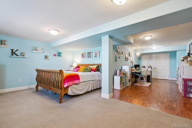 bedroom featuring hardwood / wood-style flooring