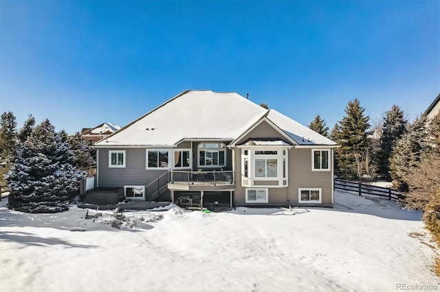 view of snow covered house