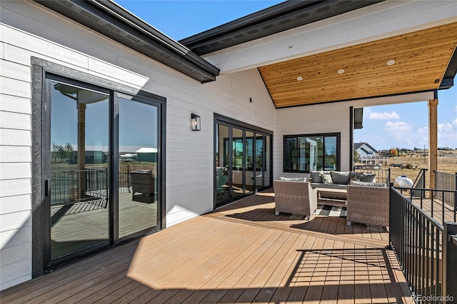 wooden deck featuring an outdoor hangout area