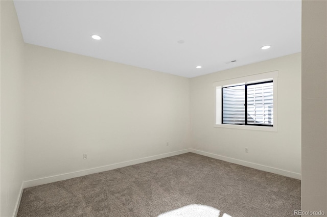 empty room with carpet flooring