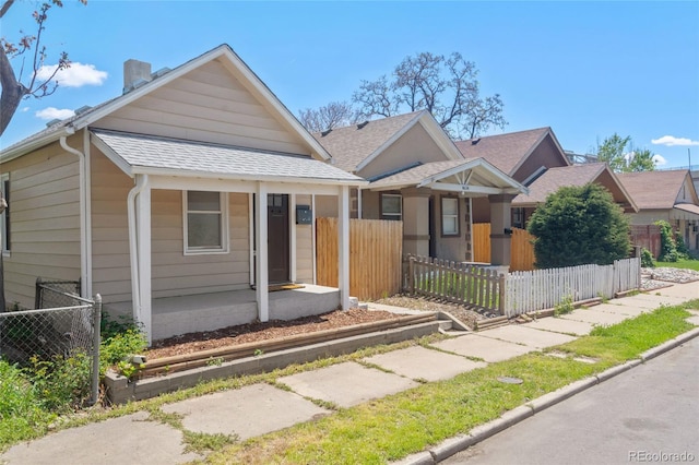 4636 Leaf Ct, Denver, CO 80216 - bungalow-style house with a shingled roof and a chimney