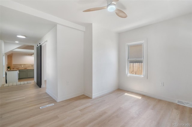 4636 Leaf Ct, Denver, CO 80216 - unfurnished room featuring light wood-style floors, ceiling fan, and baseboards