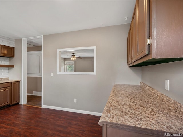 1642 S Salida Way, Aurora, CO 80017 - kitchen featuring dark wood-style flooring, light countertops, ceiling fan, and baseboards