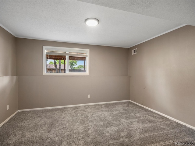 1642 S Salida Way, Aurora, CO 80017 - carpeted spare room with crown molding, baseboards, and a textured ceiling