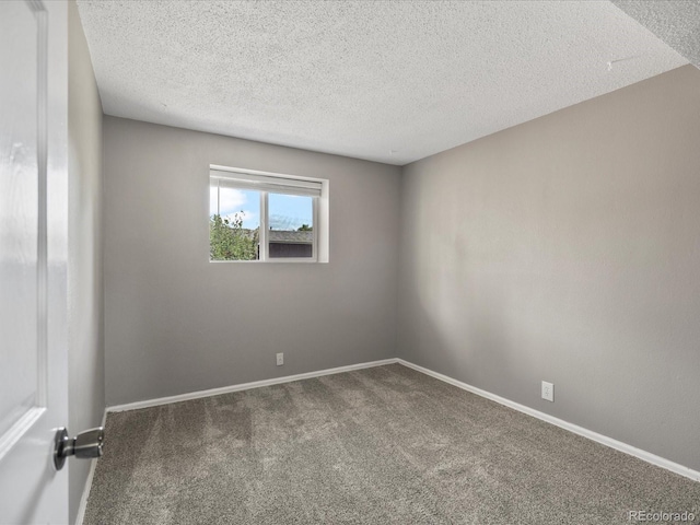 1642 S Salida Way, Aurora, CO 80017 - carpeted empty room with a textured ceiling and baseboards