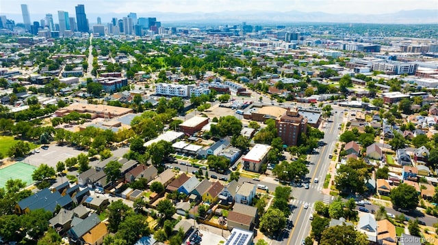 birds eye view of property featuring a mountain view