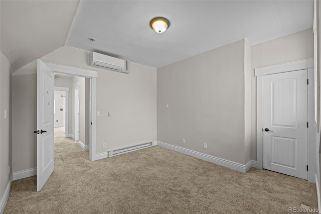 interior space featuring light colored carpet, a wall mounted air conditioner, vaulted ceiling, and a baseboard heating unit