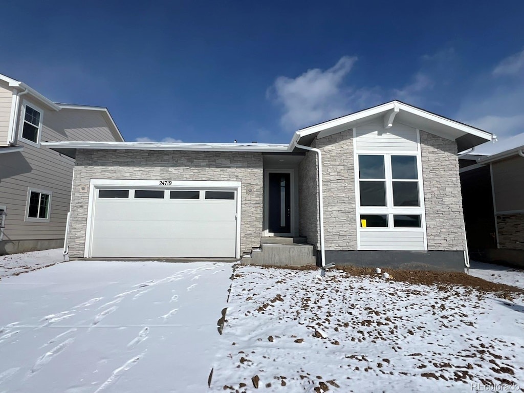 view of front of property with a garage