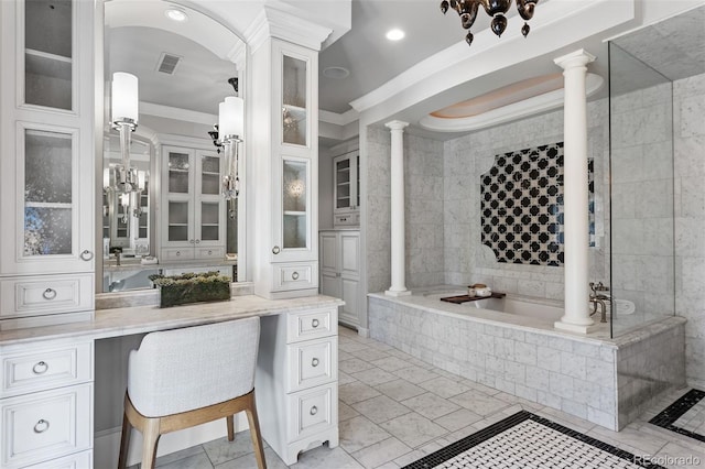 bathroom featuring independent shower and bath, crown molding, vanity, and ornate columns