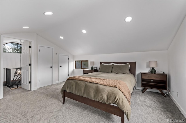 carpeted bedroom with vaulted ceiling, baseboards, and recessed lighting