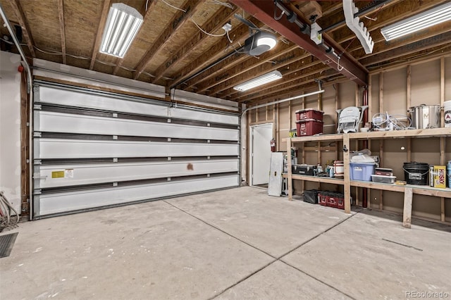 garage featuring a garage door opener