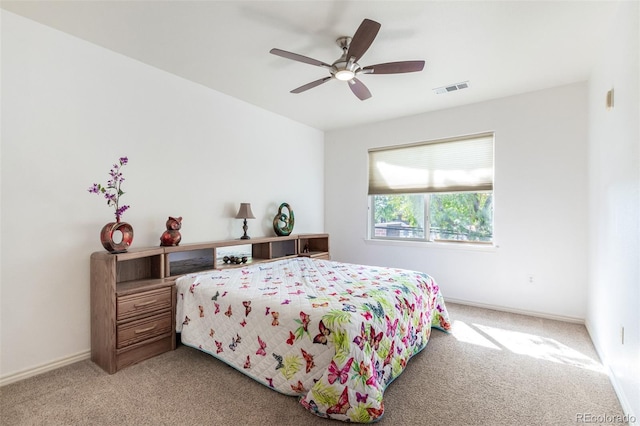 bedroom with ceiling fan and carpet