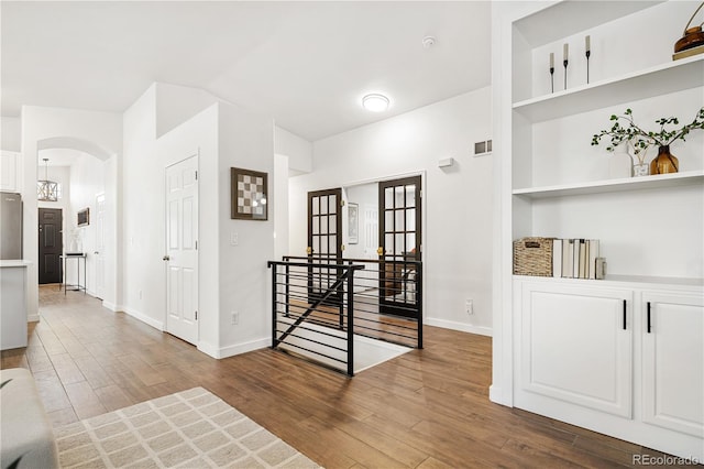 interior space with hardwood / wood-style flooring