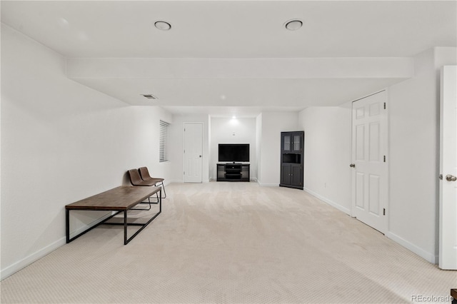 unfurnished living room with light carpet