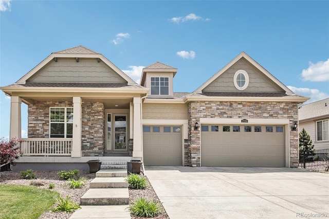 27196 E Alder Dr, Aurora, CO 80016 - view of front facade featuring a garage, covered porch, driveway, and stone siding