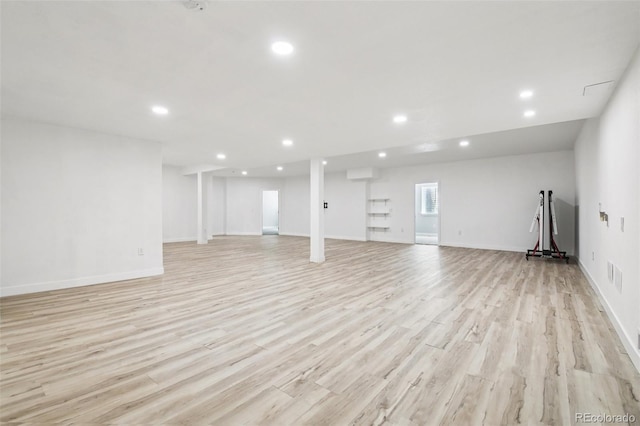 27196 E Alder Dr, Aurora, CO 80016 - below grade area with recessed lighting, light wood-type flooring, and a wall mounted air conditioner