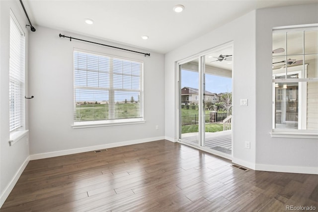 27196 E Alder Dr, Aurora, CO 80016 - unfurnished room featuring plenty of natural light, wood finished floors, and recessed lighting
