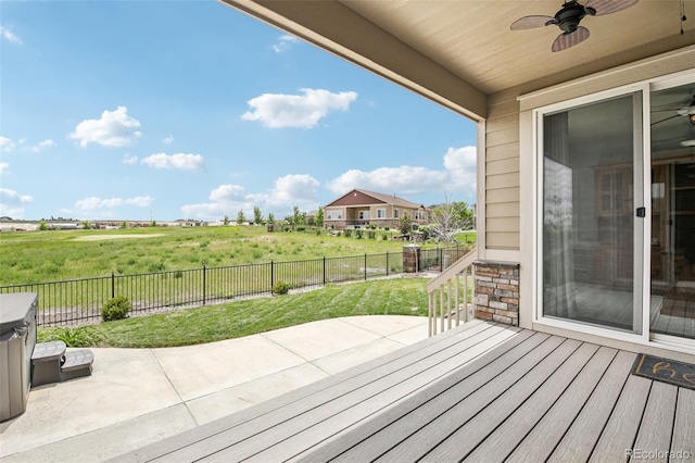 27196 E Alder Dr, Aurora, CO 80016 - wooden deck with a ceiling fan, a fenced backyard, and a patio area