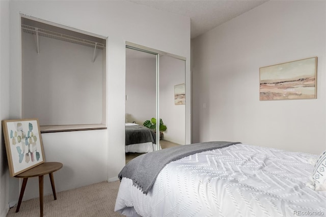 2620 S Federal Blvd Unit K, Denver, CO 80219 - carpeted bedroom with two closets