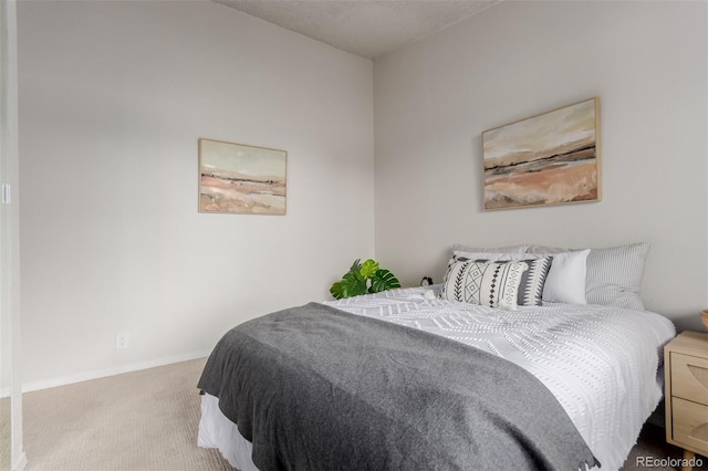 2620 S Federal Blvd Unit K, Denver, CO 80219 - carpeted bedroom with baseboards
