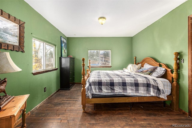 bedroom featuring dark wood-type flooring