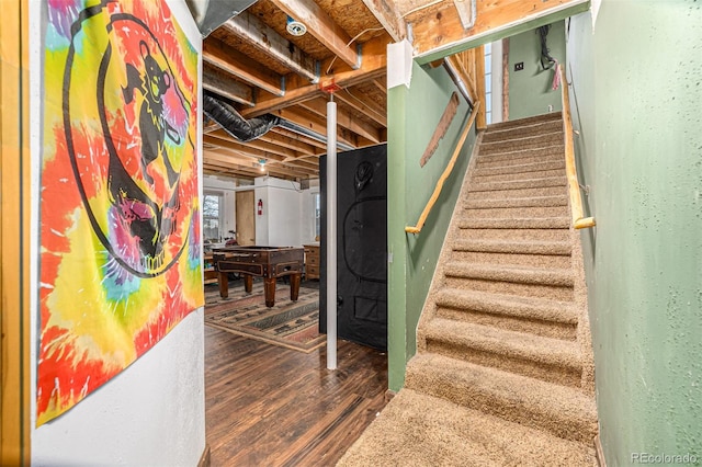 stairway featuring hardwood / wood-style flooring