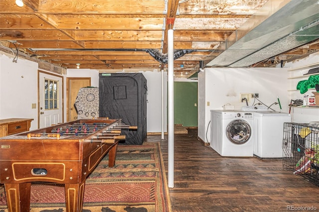 laundry room featuring separate washer and dryer and dark hardwood / wood-style floors