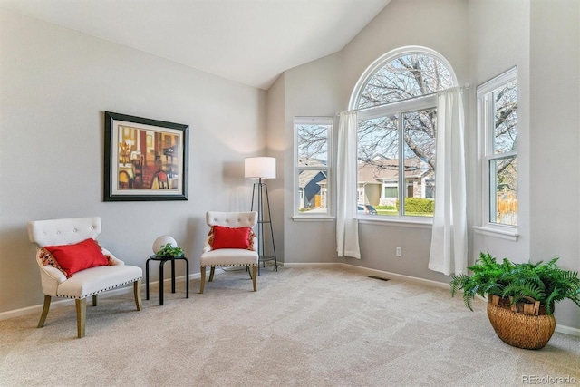 10470 W Cooper Pl, Littleton, CO 80127 - sitting room with healthy amount of natural light, carpet floors, baseboards, and high vaulted ceiling
