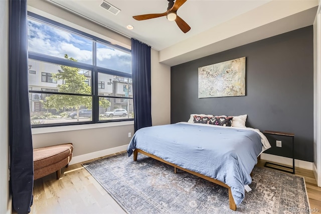 6849 E Lowry Blvd, Denver, CO 80230 - bedroom featuring baseboards, wood finished floors, ceiling fan, and recessed lighting