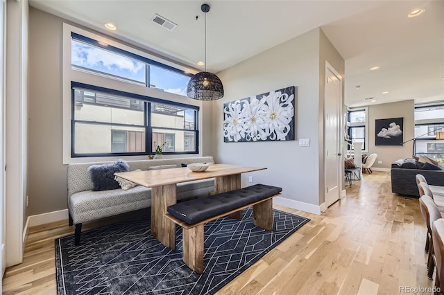 6849 E Lowry Blvd, Denver, CO 80230 - dining room with light wood-style flooring, baseboards, recessed lighting, and breakfast area